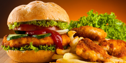 Big hamburger with French fries
